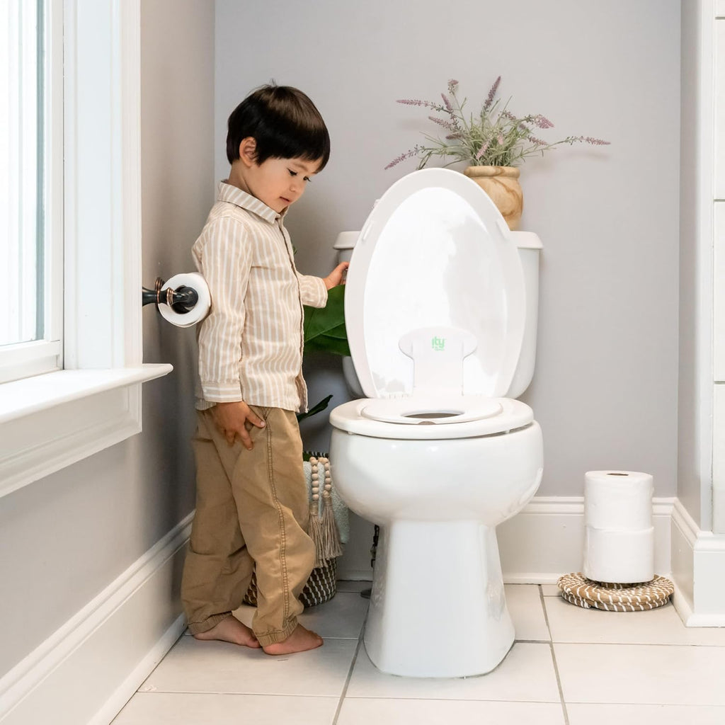 Ingenuity Flip & Sit Potty Seat (White) – Easy to Set Up & Remove Potty Training Seat That Attaches to Adult Toilet Seat